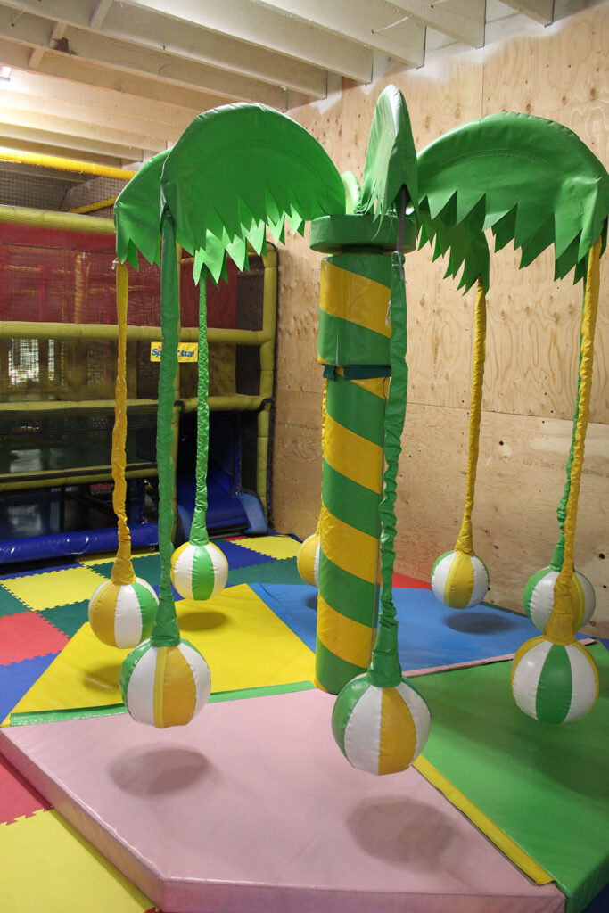 Palm tree with green and yellow stripes